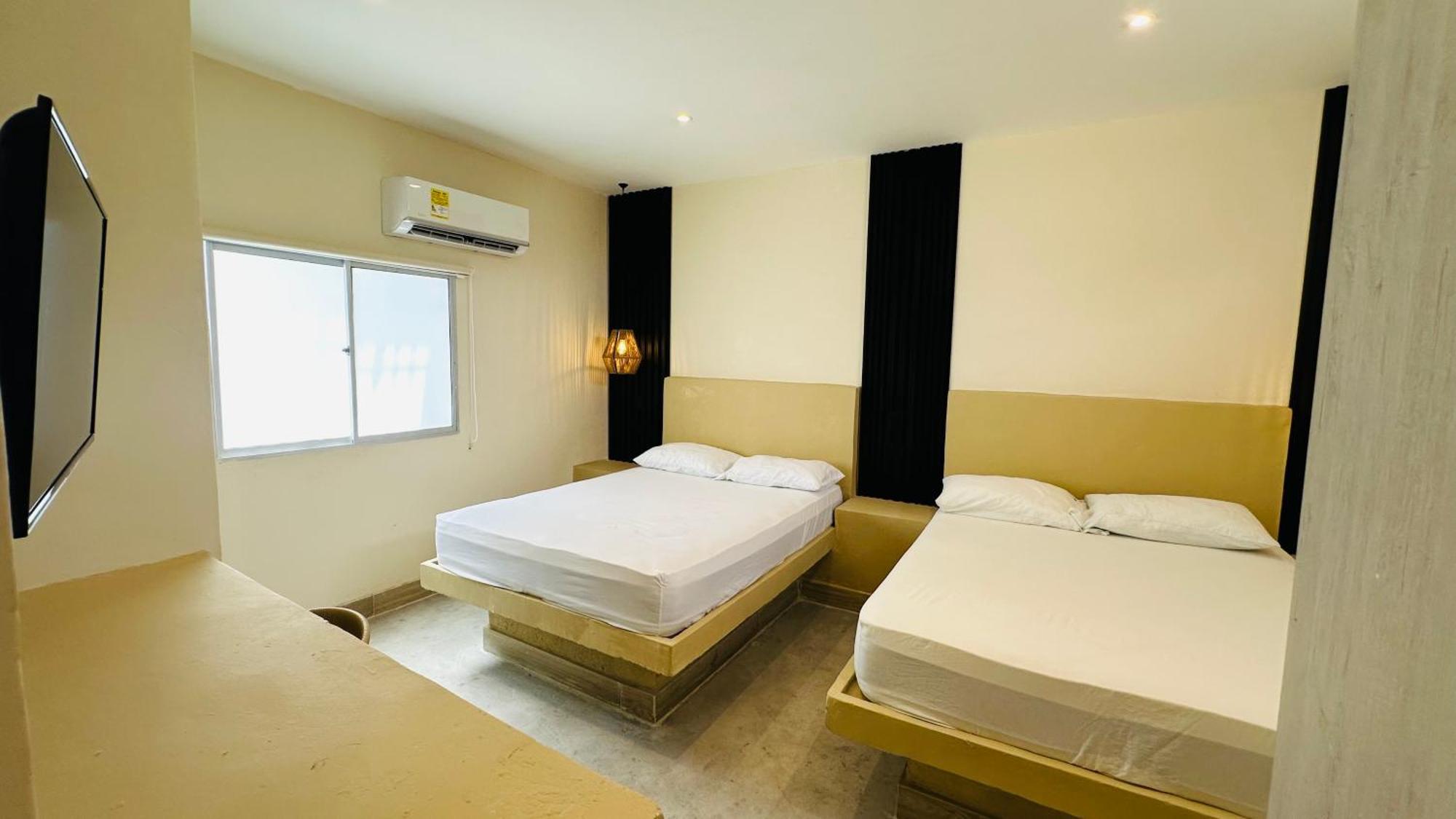 Hotel The Host At Santa Marta Pokoj fotografie